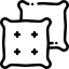 Two square pillows, each with four small dots arranged in a square pattern, are shown overlapping slightly.